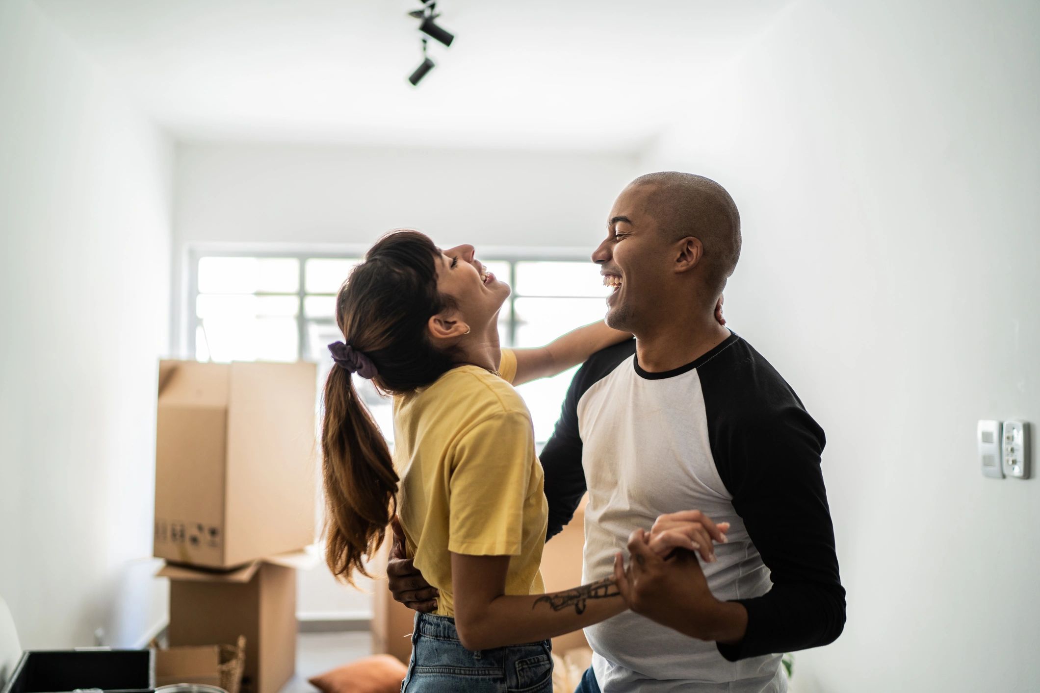 Happy couple celebrating their new home